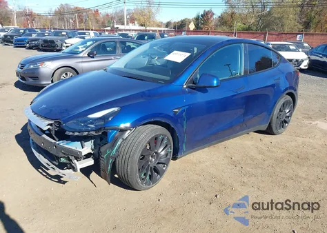 2025 Tesla Model Y Performance Dual Motor All-Wheel Drive z USA, uszkodzony, nr VIN 7SAYGDEF4SA353834